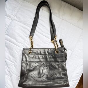 CHANEL Black Leather Shoulder Bag with Gold Chain Straps